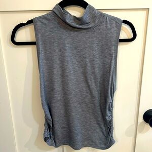Ruched-side, mock-neck Lululemon tank.  Size 4.  In excellent condition.